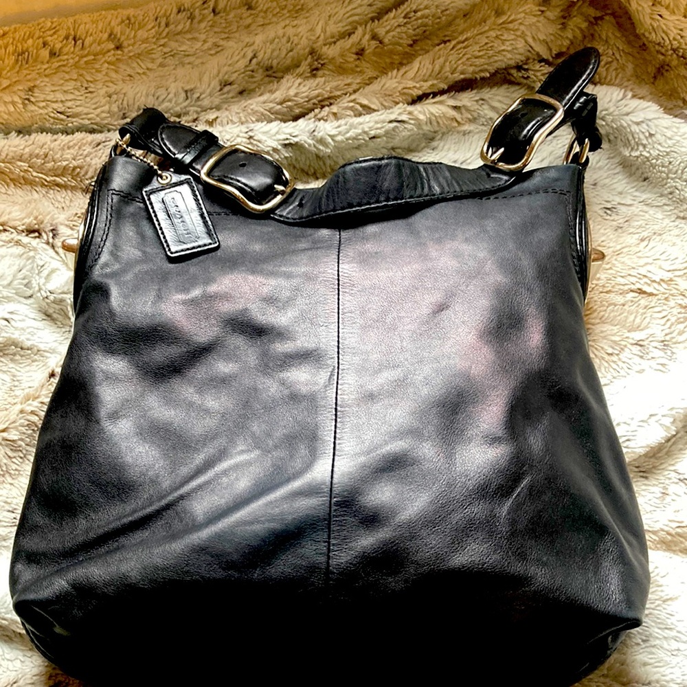 Coach leather purse gently loved and in great condition.